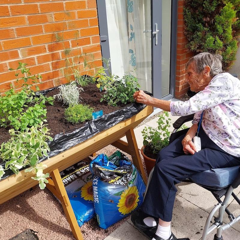 resident doing gardening