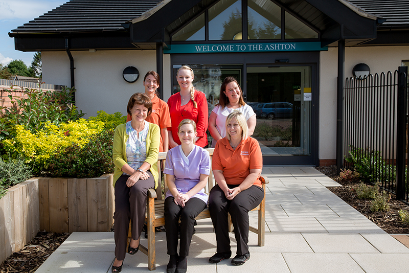 Some of The Ashton Care Home team sat outside.