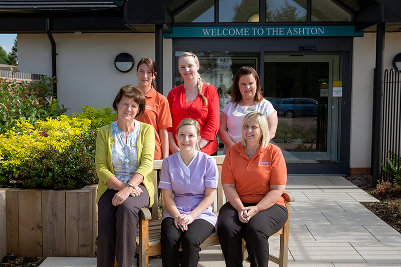 Staff members outside The Aston Care Home.