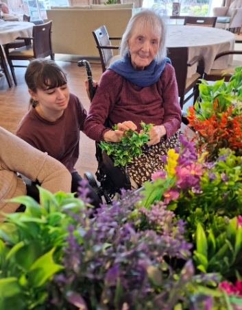 resident picking out flowers