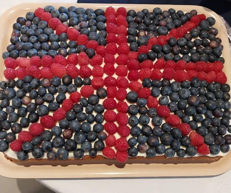 VE themed cake with blueberries and raspberries on