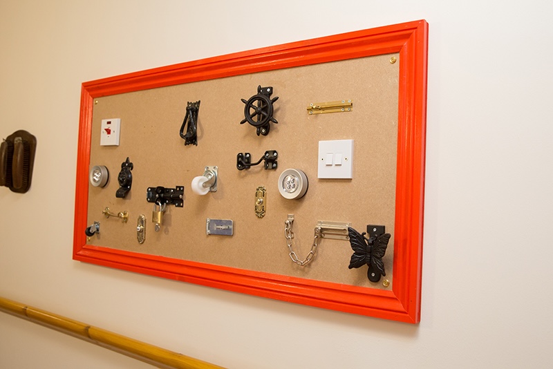 framed photo of parts on the wall