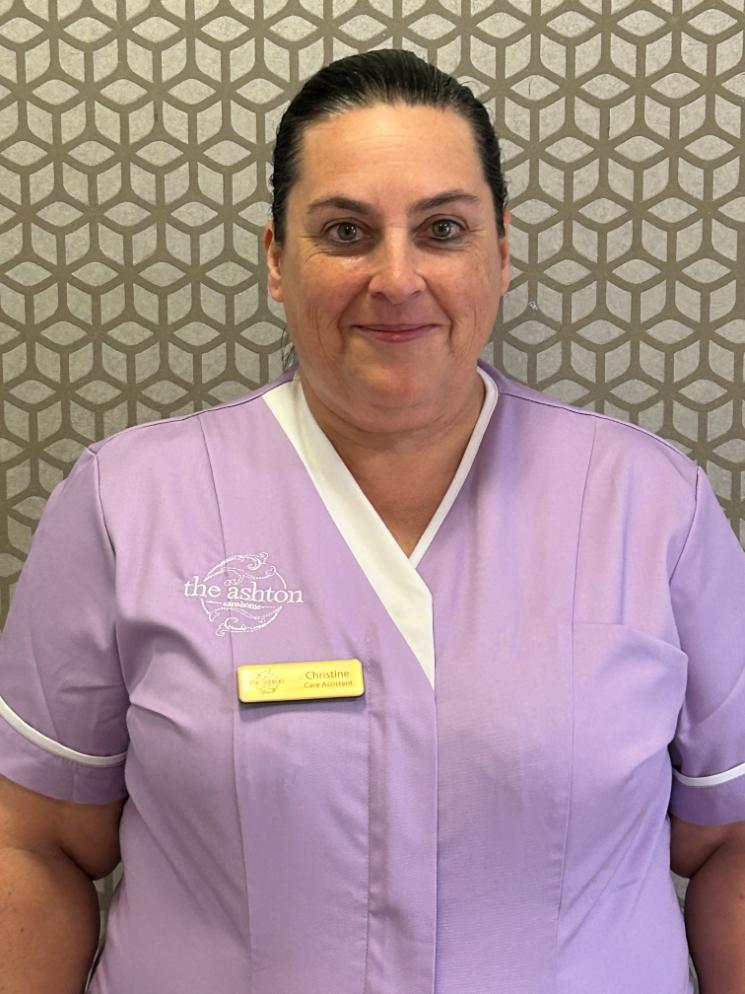 lady smiling at camera for staff photo
